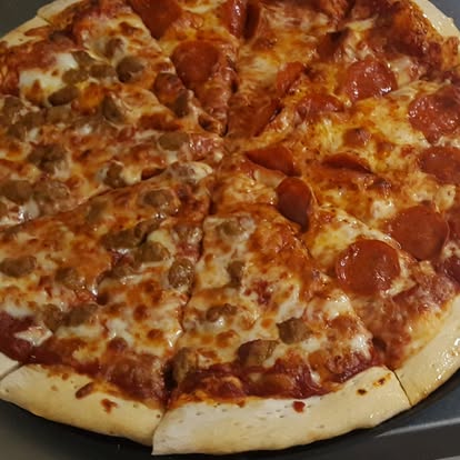 Half pepperoni and half sausage pizza