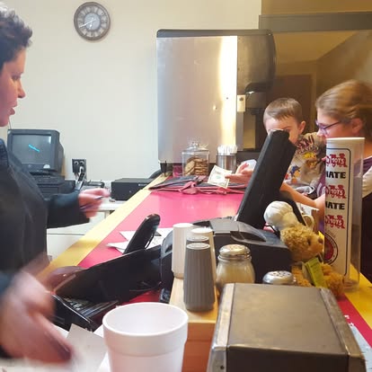 Kids at the counter ordering